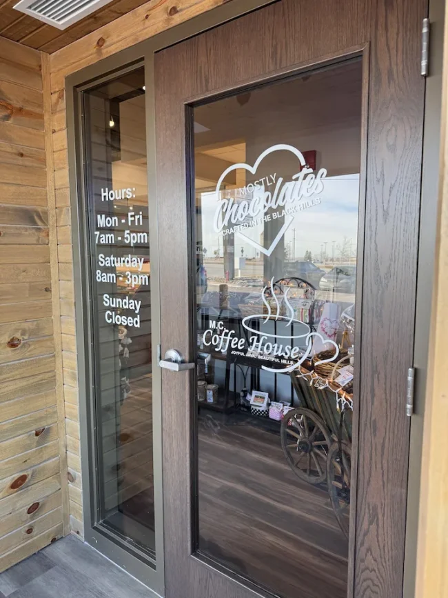 Front door of Mostly Chocolates logo in Rapid City.