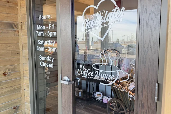 Front door of Mostly Chocolates logo in Rapid City.